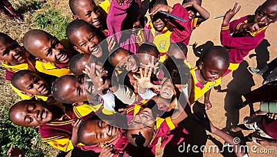 African Primary School Children on their lunch break Editorial Stock Photo