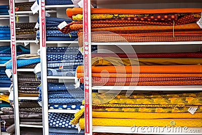 African textiles on display in a fabric shop. Editorial Stock Photo