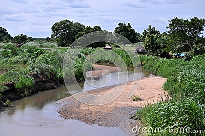 African village on riverside Stock Photo