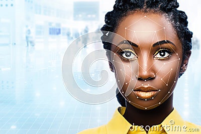 African woman with facial recognition scan on face. Stock Photo