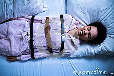 African Woman With Sleep Paralysis Stock Photo