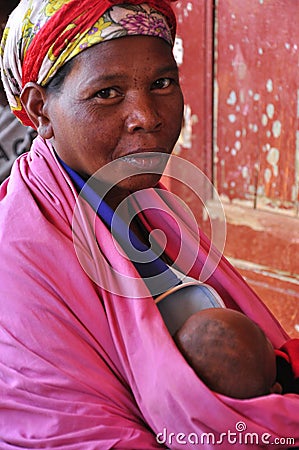 African women with baby at chest Editorial Stock Photo