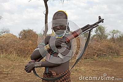 African young man with assault rifle Editorial Stock Photo