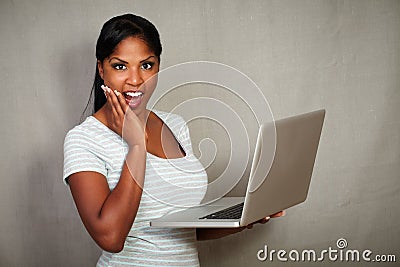 African youngster looking surprised at the camera Stock Photo