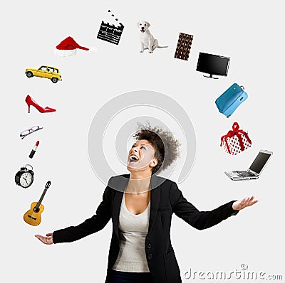 Afro-American woman juggling objects Stock Photo