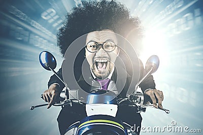 Afro businessman racing in competition Stock Photo