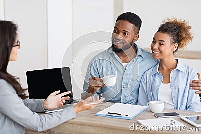 Afro Couple Attending Home Buying Consultation In Real Estate Agency Stock Photo