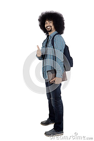 Afro male student giving a thumb up Stock Photo