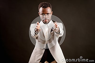 Afro moden office worker with staight arms looking and posing to the camera Stock Photo