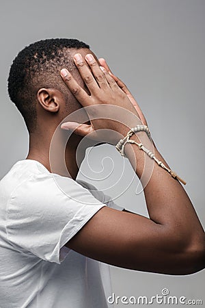 Afroamerican guy sad. Failed dreams, crushed hopes Stock Photo