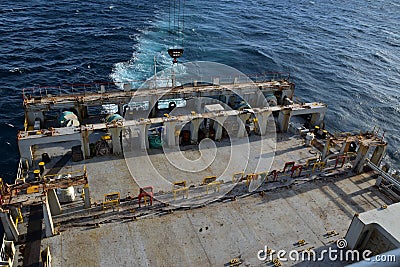 Aft part of the empty cargo container vessel underway Stock Photo