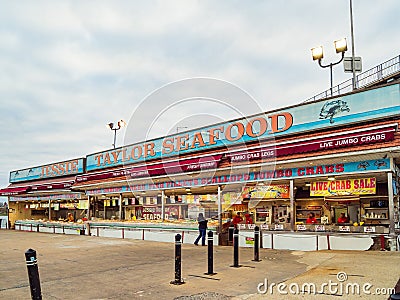 Afternoon cloudy view of the Jessie Taylor Seafood of Municipal Fish Market at The Wharf Editorial Stock Photo