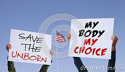 For and against legal abortion. Two women holdig posters Stock Photo