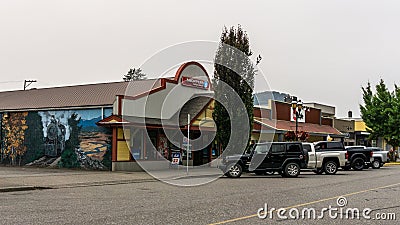 AGASSIZ, CANADA - August 18, 2018: main street in small town in British Columbia with shops restaurants cars. Editorial Stock Photo