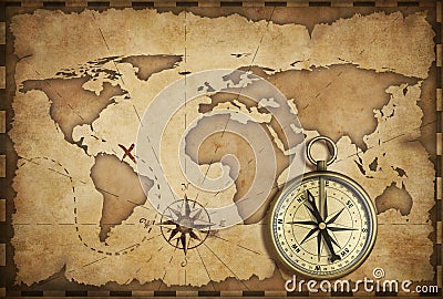 Aged brass antique nautical compass and old map Stock Photo