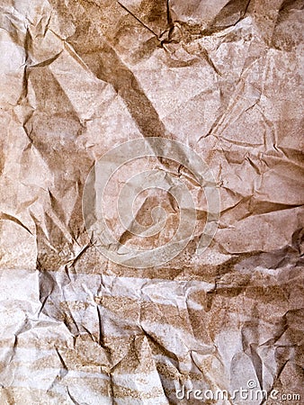 Aged crumpled yellow paper surface Stock Photo