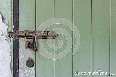 Aged door bolt Stock Photo