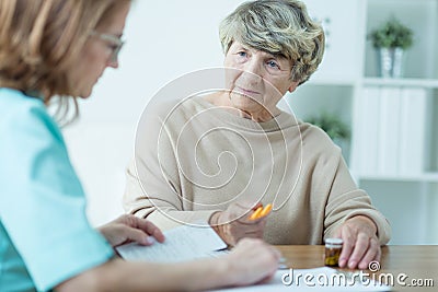 Aged female on medical consultation Stock Photo