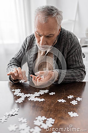 aged man with parkinsonian syndrome and Stock Photo