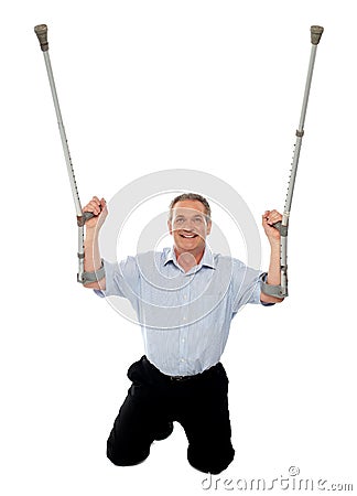 Aged man thanking God while recovering from injury Stock Photo