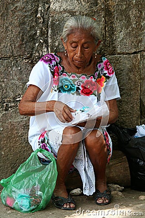 https://thumbs.dreamstime.com/x/aged-mexican-woman-old-sitting-working-to-sell-clothes-typical-44713851.jpg