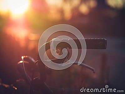 Aged Old Bicycle Handlebar in Backlight Stock Photo