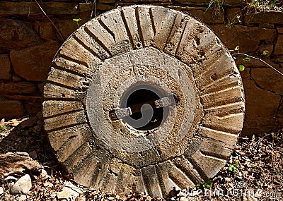 Aged old mill millwheel stone wheel in Spain Stock Photo