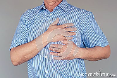 Elderly man chest pain Stock Photo