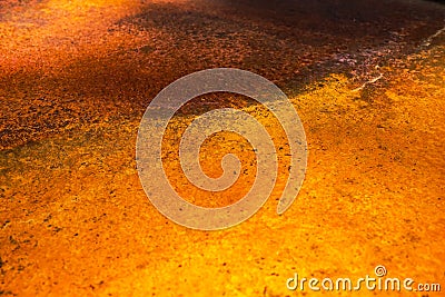 Aged rusty copper metal orange background with stains. Stock Photo