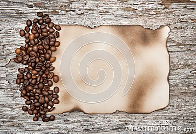 Aged sheet of paper with coffee beans Stock Photo