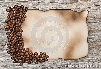 Aged sheet of paper with coffee beans Stock Photo