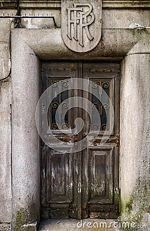 An aged, vintage wooden doorway in the historic town of Sintra, Portugal Stock Photo