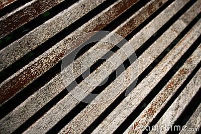 Aged weathered peeling gray wooden plank bench background Stock Photo