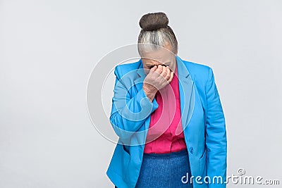 Aged woman cry and have bad mood Stock Photo