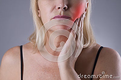 Aged woman with toothache, teeth pain closeup Stock Photo