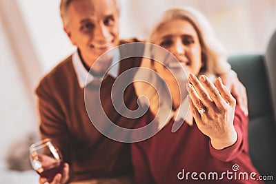 Aged woman wearing nice diamond ring Stock Photo