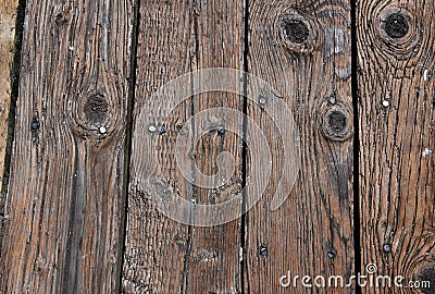 Aged worn timber boards on a pier - background texture Stock Photo