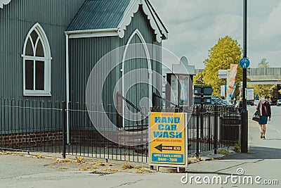 Aged and worn vintage photo of car wash sign Stock Photo