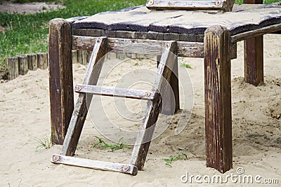 Aged, worn wooden ladder Stock Photo