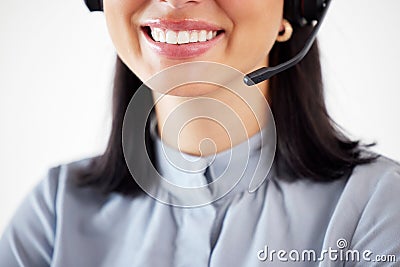 Agent call center, closeup mouth of a woman and with a headset at her modern office. Consultant or customer service Stock Photo