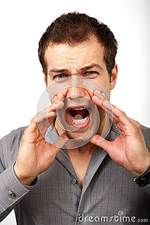 Aggresive advertising concept - scream of man announcing somethi Stock Photo