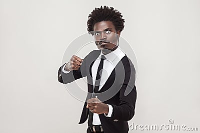 Aggressive concept. Furious businessman ready to fight. Stock Photo