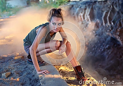 Aggressive military-style glamour girl Stock Photo