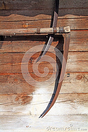 Aging scythe Stock Photo