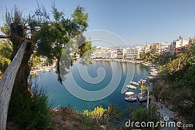 Agios Nikolaos. Crete, Greece. View on the lake and docked yachts Stock Photo