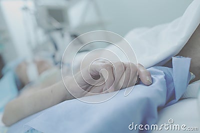 Agony of irremediable patient in ICU Stock Photo