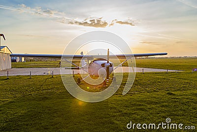 Agreement airplane parked in front of his hangar Stock Photo