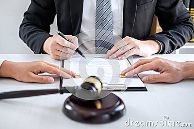 Agreement prepared by lawyer signing decree of divorce dissolution or cancellation of marriage, husband and wife during divorce Stock Photo