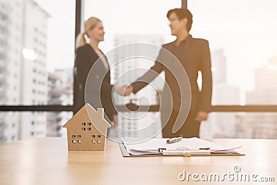 Agreements between business women and Asian partners, Business concepts and signing contracts Stock Photo