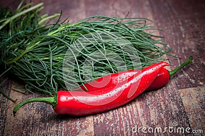 Agretti And Chili Peppers Stock Photo